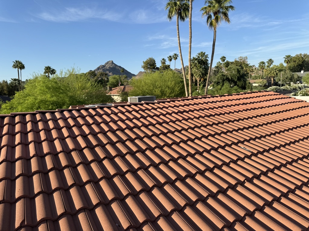 Barrel tile roof in Phoenix with Piestewa Peak behind it